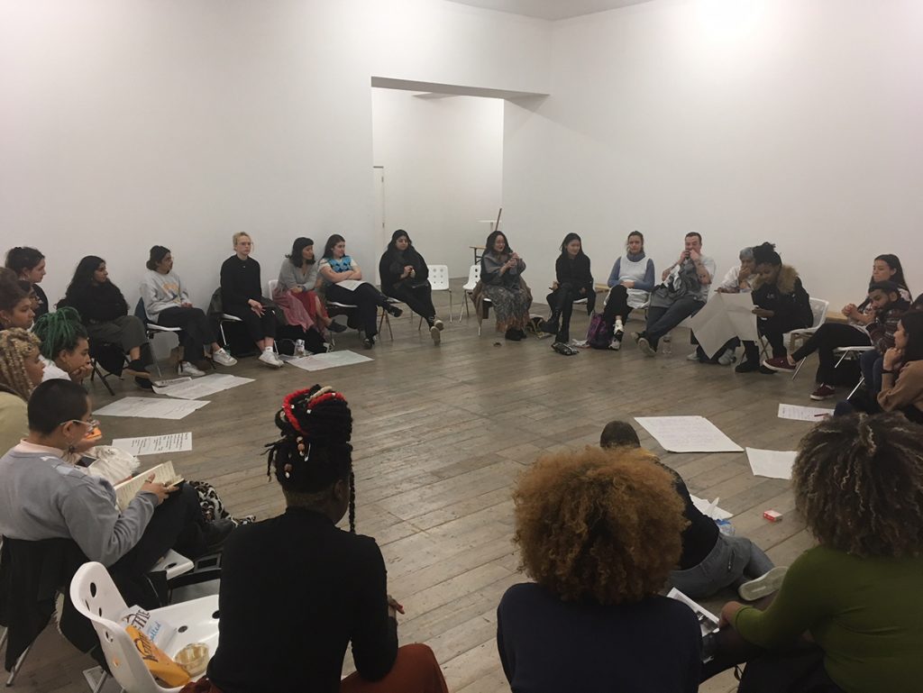 Students sitting around in a circle